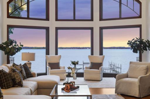 Immerse yourself in the tranquility of lakeside living in this stunning living room.