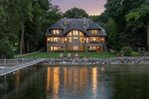 Introducing 20630 Linwood Road, nestled on two acres in the heart of Cottagewood USA. This gated estate sits on 134 feet of premium northwest-facing, sandy, level lakeshore on Lake Minnetonka.