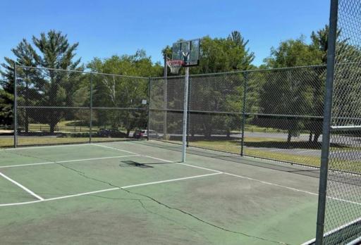 THE BASKETBALL COURT IS READY FOR A LITTLE ONE-ON-ONE OR BRING IN THE TEAM FOR A FRIENDLY GAME !