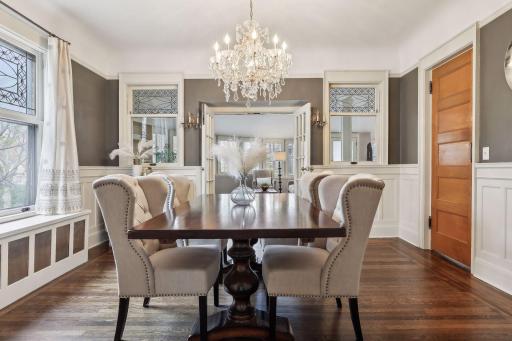 This expansive dining room offers extraordinary original detail and french doors lead to the family room.
