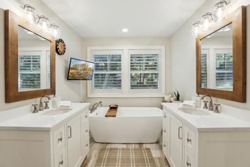 Spa-like features fill the primary bath. Enjoy relaxing baths, dual vanities and a separate shower with tile surround
