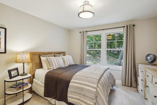 Bedroom 3 on upper level offers a walk-in closet