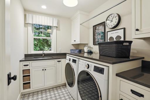 Convenient upper level laundry offers great function and storage