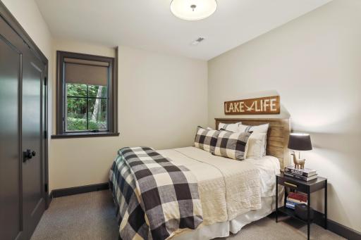 The fifth bedroom is located on the lower level