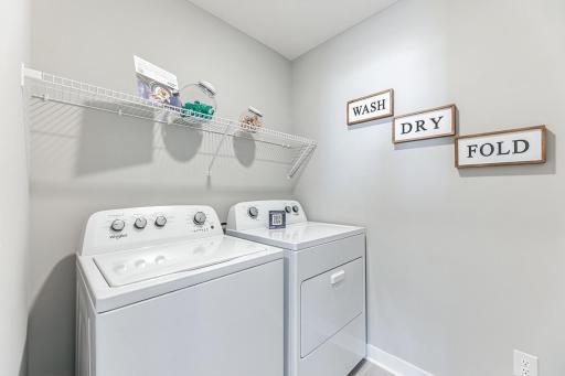 Only a few short steps from the bedrooms you'll find the laundry room for easy access and use!