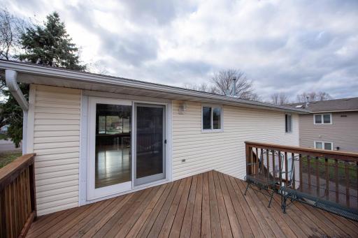 Relax on the deck & do some grilling! Walk in to dining room with kitchen on the right, and living room straight ahead.