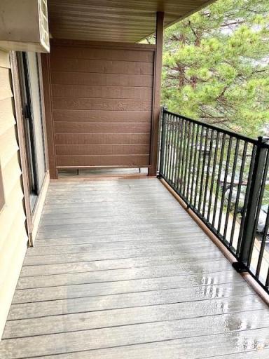 COVERED DECK WITH NEWER UPGRADED DECKING BOARDS.jpg