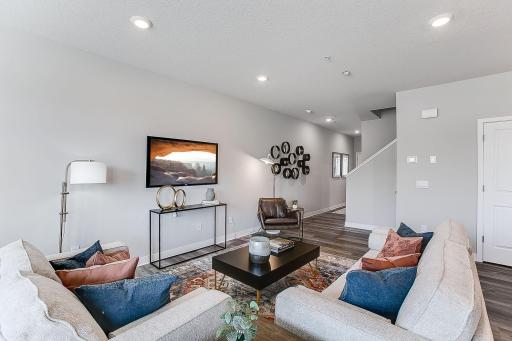 Open and spacious main level, with a great living room at the center. *Model home photo, selections may vary.