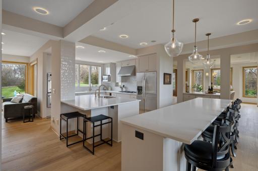 The spacious, functional kitchen comes equipped with high-end stainless-steel appliances.
