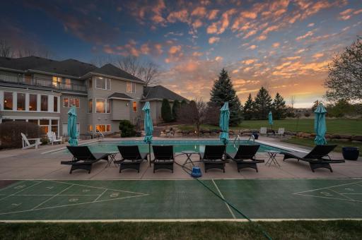 To-die-for backyard! Amazing landscaped, rolling country hills, beautiful wooded area and mature trees, and look at that pool!