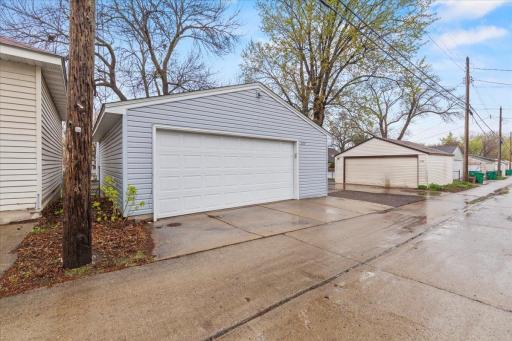 2+ car garage with extra parking pad to right