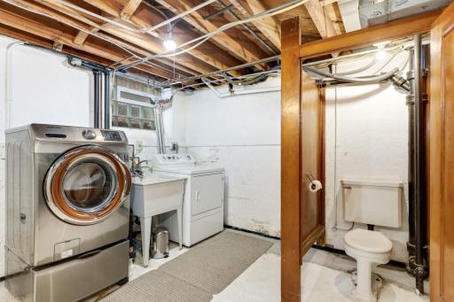 Laundry space and basement 1/4 bath. Space is here to increase to full or 3/4 bathroom, if desired.