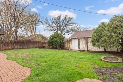 Oversized, fully fenced lot offers great space for a garden or your furry friends!