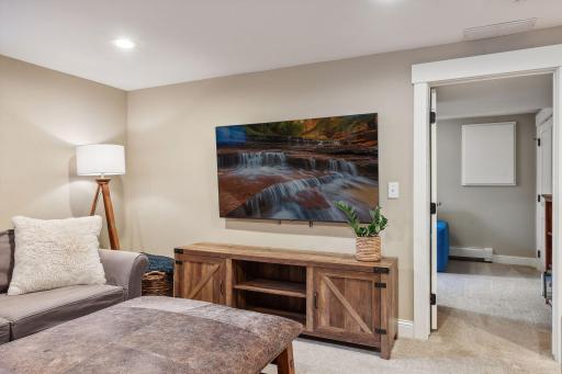 Recessed lighting adds brightness to the space.