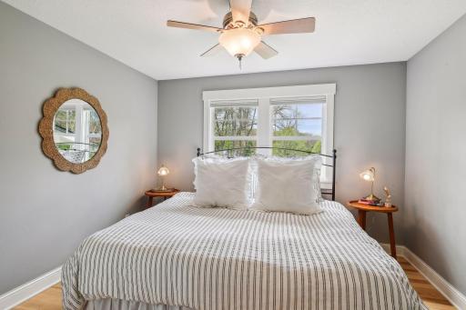 One of five bedrooms on the upper levels of the home, this is currently used as a guest space by the current owners.