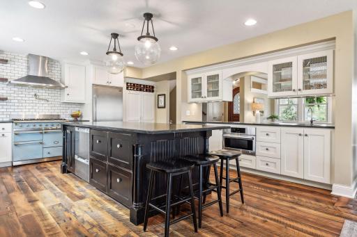 Reclaimed barnwood flooring is a charming and comfortable touch.