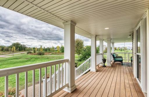 Photo for 20326 Sodium Street NW, Anoka, MN 55303 - listing #6522250 Expansive maintenance free front porch spanning the front façade offers picturesque views. Convenient for morning coffee and entertaining.