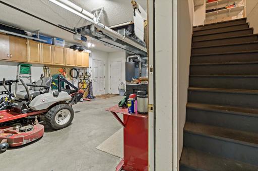 Lowe level garage with stair case to UL garage_3250 Lakeside Dr