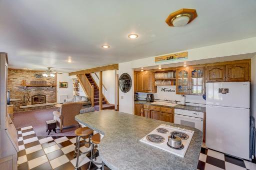 This lower-level living space and kitchen. IDEAL for guest or Airbnb potential.