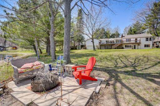 This great flat backyard is a great asset. This lot has 150 ft of lakeshore!