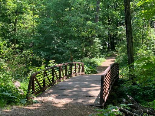 Just down the road is Henry's Woods, a storybook nature preserve with wonderful walking trails!