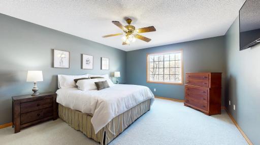 The spacious Primary bedroom includes a private 3/4 bath and walk-in closet!