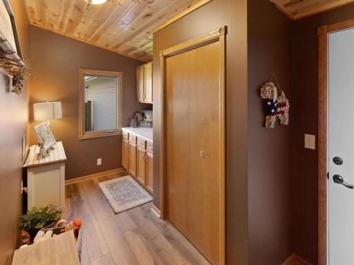 The large mudroom as you enter from the garage is also plumbed for washer and dryer.