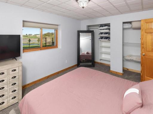 Lower level bedroom highlights include two spacious closets and gorgeous views of the waterways.
