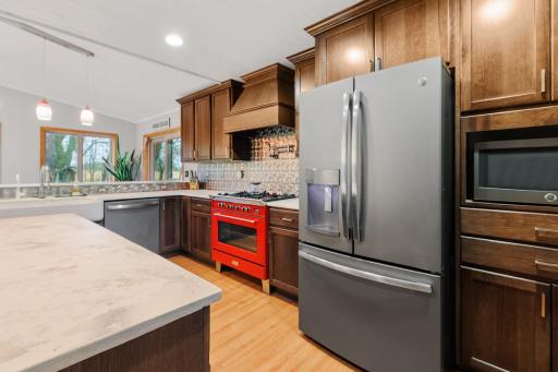Beautiful kitchen! Refrigerator and separate faucet on sink have RO