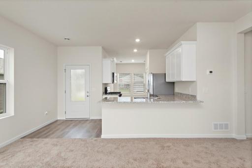 Living room flooring will match kitchen - (no carpet)