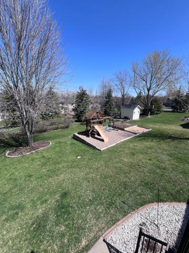Wonderful backyard with playset and garden. Garden does have sprinkler heads in it.