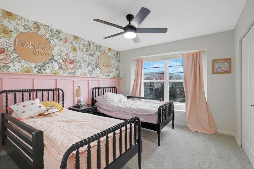 How adorable is this 2nd bedroom on the upper level?