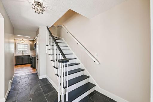 Foyer - Elegant entryway staircase leading to the second story bedrooms
