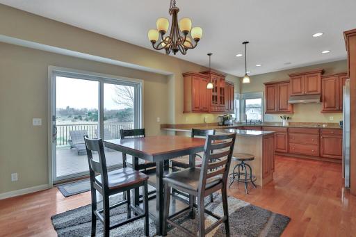 Kitchen/Dining area with access to rear deck and view of the back yard.