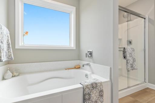 (Photo is of a model, homes finishes vary) Another view of the primary bath.