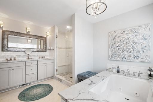 Newly added primary bath with granite countertop with double sinks and huge walk-in shower