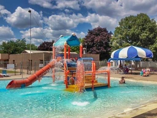 Lorraine Park has an outdoor Splash Pool! This interactive zero-depth entry pool is tailor-made for young children and those new to water exploration. With a slide, water spray areas, and a bathhouse complete with a concession stand.