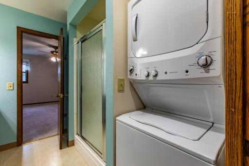 Convenient main level laundry located adjacent to the primary bedroom for ease of use.