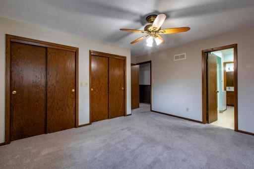 Spacious double closets offering ample storage for the primary bedroom.