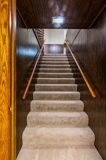 Expansive staircase providing easy access between levels with its generous width
