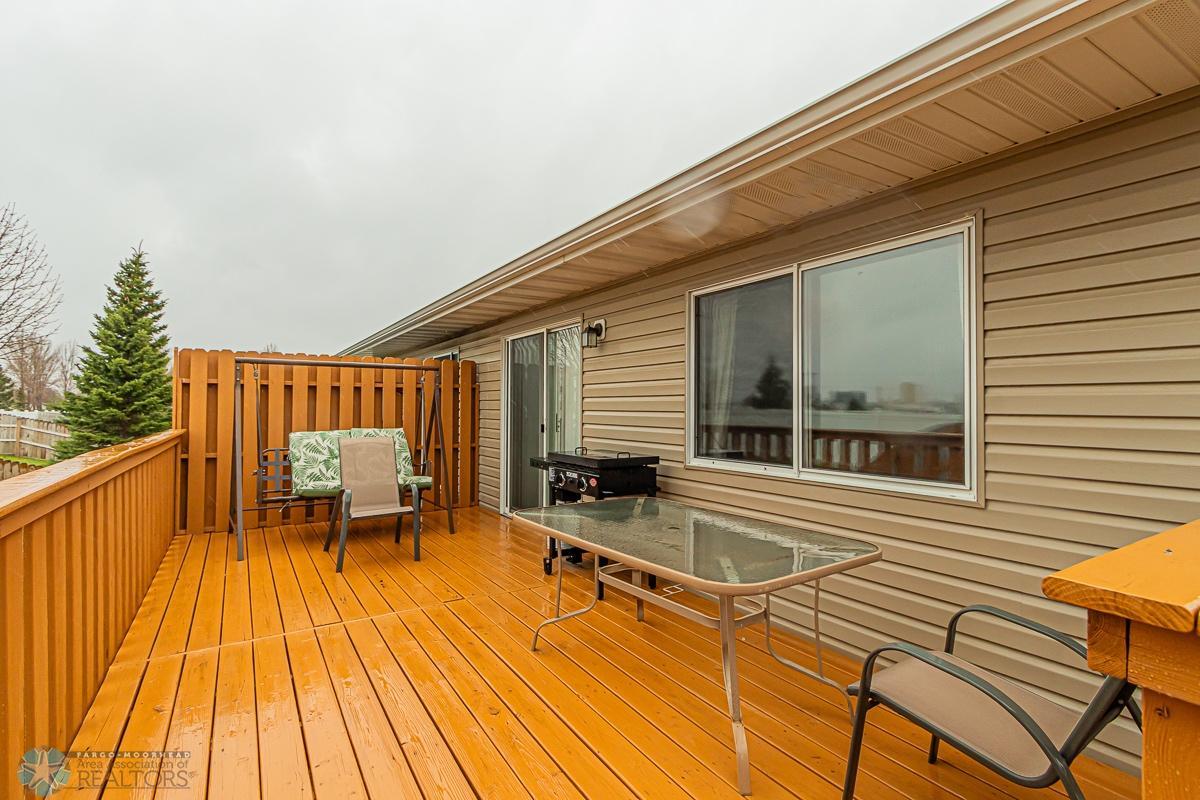 Extra large Deck overlooks private backyard; it's fenced & no backyard neighbors!