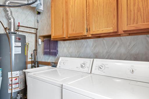 Additional highlights include a convenient laundry room and an attached 2-car garage for added storage and security.
