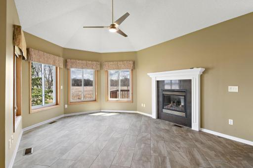 Imagine yourself in this sunny parlor room with beautiful heated ceramic flooring, an attractive gas fireplace, and those wonderful views you will soon be accustomed to- your smile will be working overtime!