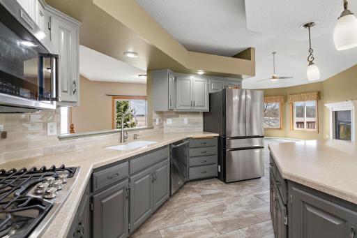 Another great view of your kitchen!Note the extra large refrigerator/freezer with an extra freezer drawer!