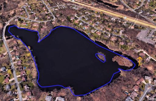Google Earth view of the lake with Yellow arrow towards the home