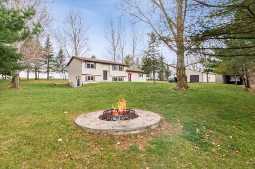 Enjoy the fire pit and admire the pond across the road