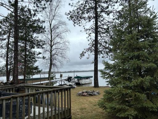 Looking towards the lake from the cabin by side of deck.