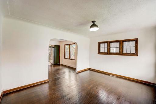 Walk inside to neutral colors, rich floors and abundant natural sunlight that streams through the many large windows.