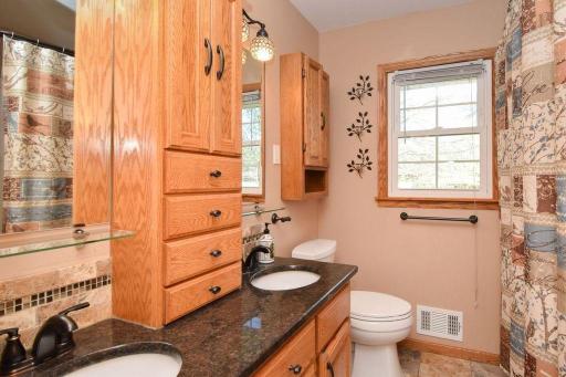 Main bathroom has double sinks & granite counter!