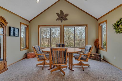 Great space for game night or extra seating for family gatherings. The windows provide exceptional views of the private wooded backyard!